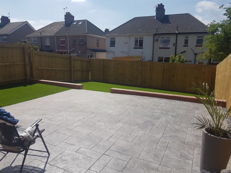 Pattern imprinted concrete- artificial grass